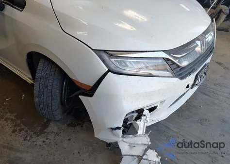 2018 Honda Odyssey Touring z USA, uszkodzony, nr VIN 5FNRL6H84JB020671